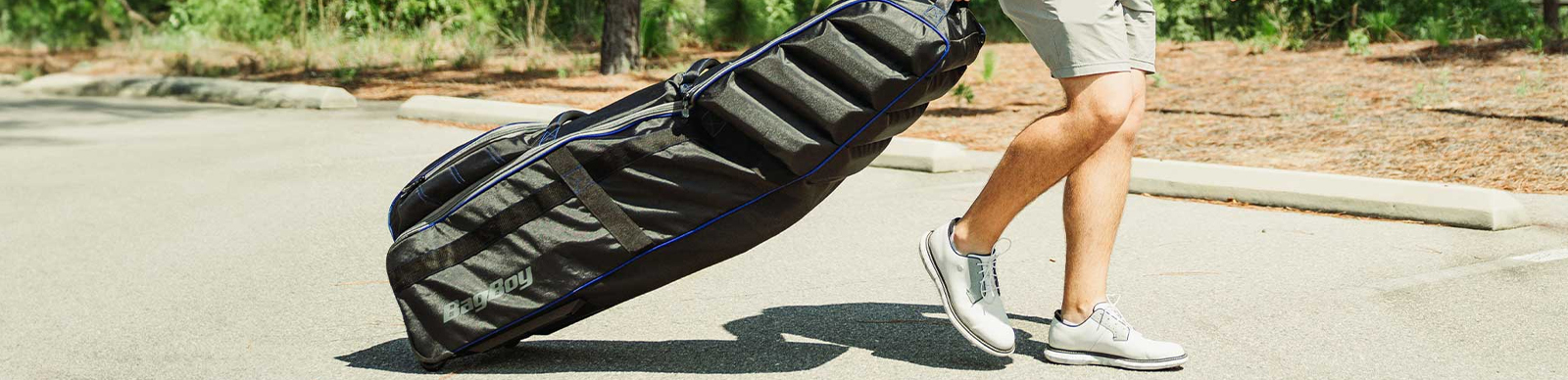 Golfer using a golf travel cover